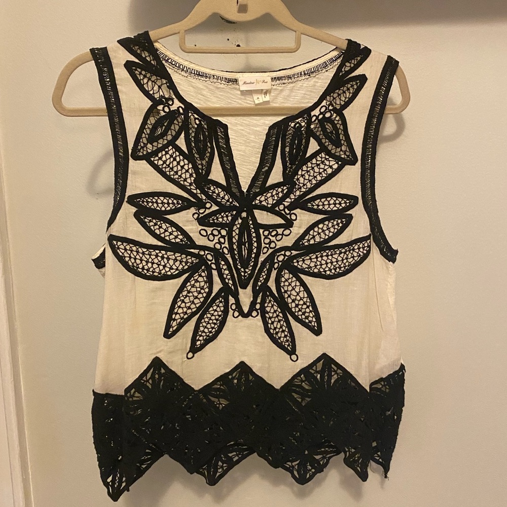 Anthropologie black ocean detail top! Size M.